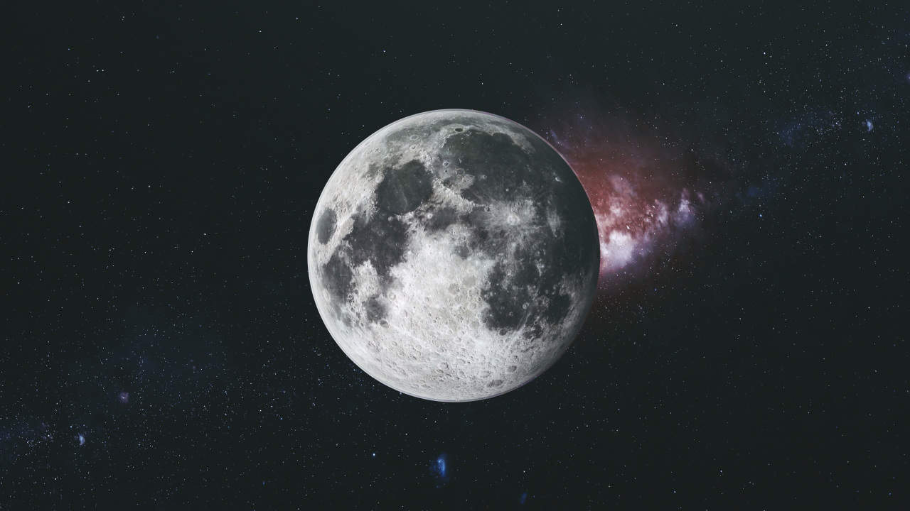 La superficie lunare e sullo sfondo la Via Lattea